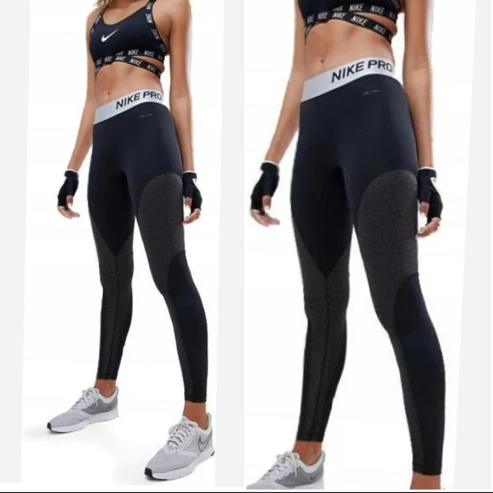Nike Pro Warm Sparkle training tights in black and metallic gold. Size M